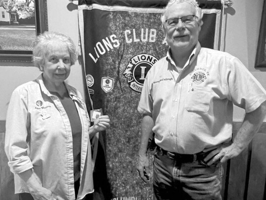 The Columbus Lions Club held there weekly meeting at Schobels Restaurant at noon on Monday, Feb. 6. (Above) The guest speaker was Pastor Dan Pore, executive director for FAYS (Family and Youth Success). Pictured with Pore is Darrel Appelt. (Right) During 