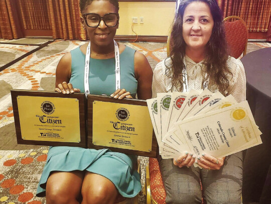 Alesia and Citizen General Manager Tressa Alley pose with awards the newspaper earned at the 2022 Texas Press Association annual convention. The Citizen won the second most awards in their category.