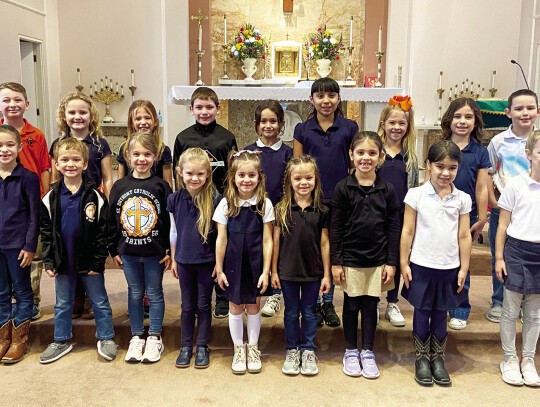 The SAS first graders led Mass for the first time last Friday and did such a sweet job. Pictured are: (front row) Ruth Walla, Wesley Muzny, Louise Glueck, Marley Landry, Carys Barten, Theresa Fitzgerlad, Brynlynn Shifflett, Laurel Becerra, Livie Neal, (ba