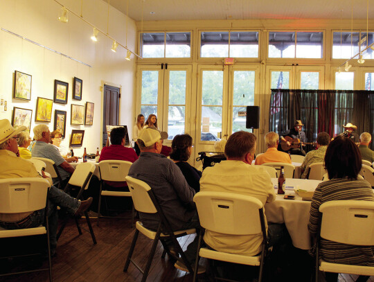 The audience watches Darrel Appelt and Phillip Brummett at the Live Oak Art Center’s first Songwriter Series Fundraiser Concert.