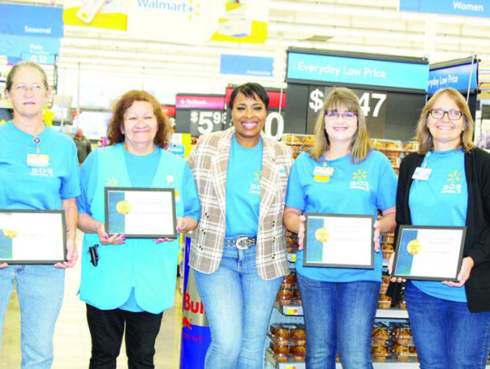 Store Manager Montraie Baldwin White with long-time store associates-Susan Zatopek (left), Elizabeth Rodriguez, Kimberly Kovar and Rose Urban.