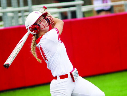 Sophia Wolters takes a big chop at a pitch.