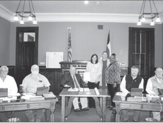 A proclamation was read by Judge Ty Prause recognizing April as Child Abuse Awareness and Prevention Month. Pictured with Judge Prause and commissioners are CASA Operations Director Nicole Guillory (right of Judge) and representatives of CASA for Kids of 