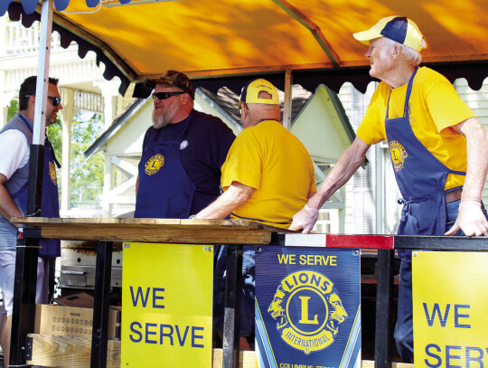 Columbus Lions sell their signature Lion Burgers.