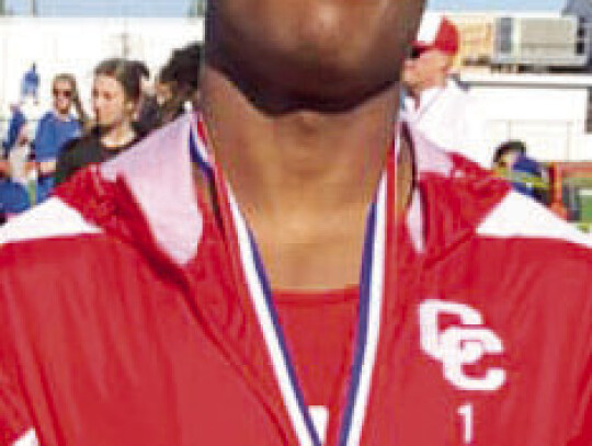 Left: Ty’Vone Whitehead is the Regional Champion in the short-distance sprint after his performance at the regional meet. Right: Kloe Woytek and Scarlett McClelland took on track events at the regional meet after strong performances at the area meet. Co