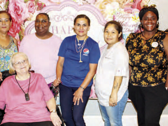 Volunteers from left- Bobbie Jo Contreras, Patsy Mrkwa (sitting), Carla Johnson, Valeen Soliz, Flower Carter, and Activity Director at Columbus Oaks Assisted Living facility LaBrittany Miller. Not pictured-Roslyn Johnson.