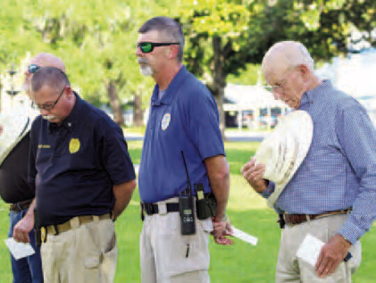 Local law enforcement paying respects to fallen officers. From left – Colorado County Chief Deputy Troy Neisner, Weimar Police Chief Todd Jacobs, and Colorado County Sheriff R.H. Weid