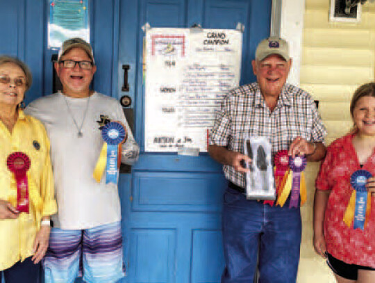 Winners of the Weimar Encore Lions Club Annual Pie Contest and Auction: Clara Bartek (left), women’s second place with a bourbon pecan pie, Tracy Baumgartin men’s first place with a green grape pie, Doc Rugeley grand champion with a pecan pie, and Kyl