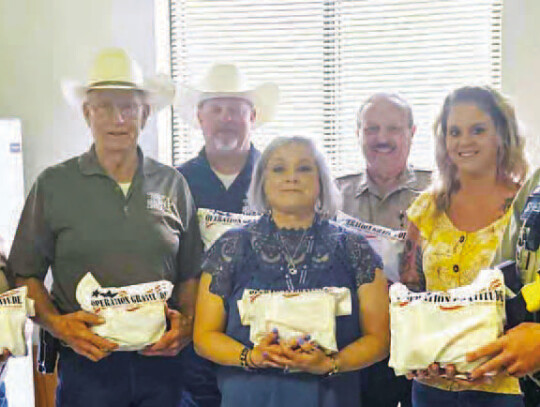 Colorado County Sheriff’s Office Sergeant Investigator Beth Mayfield, Sheriff Curly Wied, Chief Deputy Troy Neisner, Colorado County Citizen Missy Theriot, Deputy Donnie Templeton, The Sealy News Amanda Luska, and Deputy Ben Melendez.