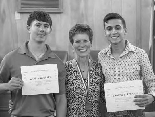 Gail Warschak with her two seniors from Rice, Zane Zbranek on the left and Gabriel Polanco on the right.