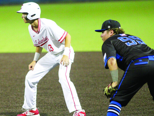 Trevor Berger gets a lead off from first base against Saint Gertrudis.