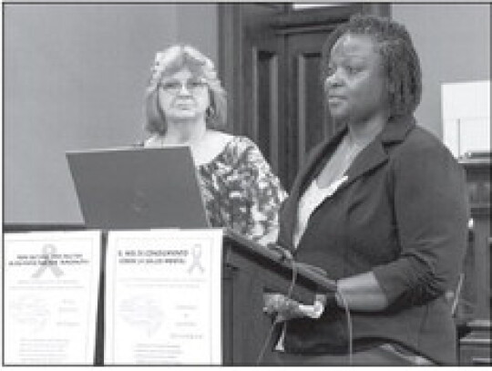 Left: Odette Elliston, LCSW (right) and Denise Sklar from the Lighthouse at Rice Medical Center speaking before the Wellness Council. Right: The Wellness Council congratulated D’Trique Fitzgerald on his academic accomplishments as he prepares for colleg