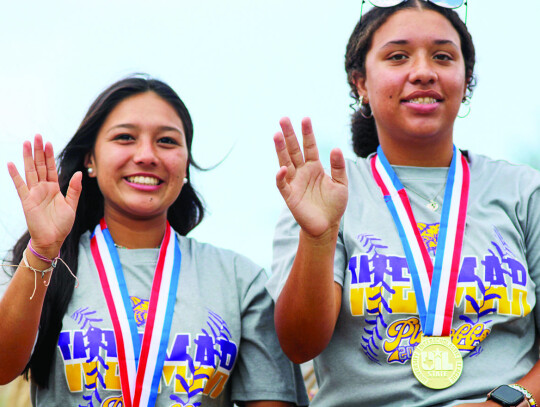 A pair of champion Ladycats, Chloe Grifaldo and Madison Luckey. Citizen | Trenton Whiting