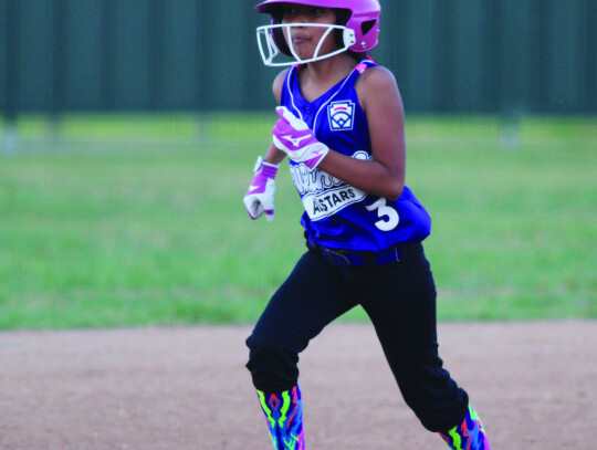 Alice Moreno heads to second base after a big hit.