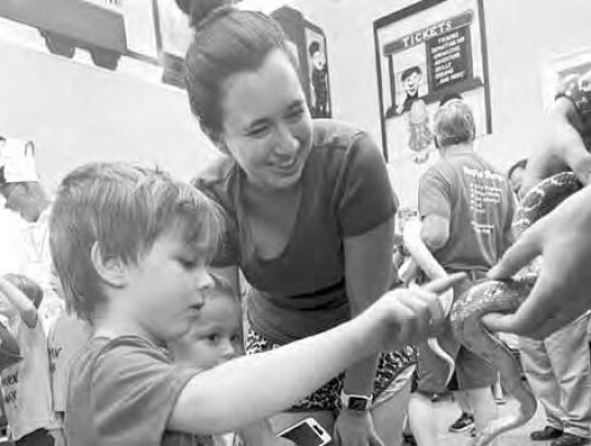 Herpetologist Clint Pustejovsky and Librarian Misty Strode. Courtesy photos