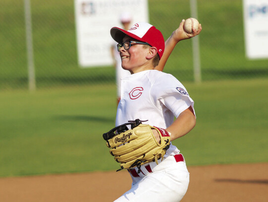 Kellen Berger just before uncorking a pitch against Weimar Little League.