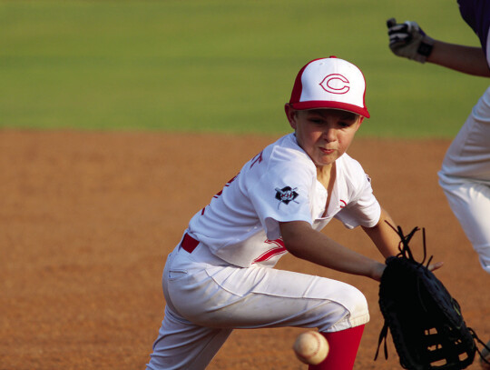 Brazoz Blount picks the ball from a bounce at first base.