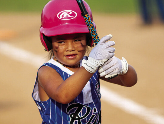 Marie Cardenas prepares for her at-bat.