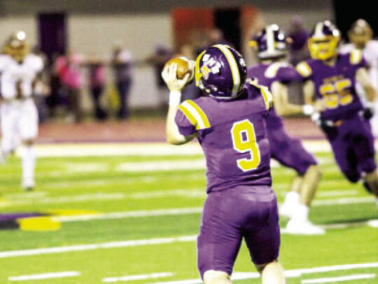 Sam Reidlinger receives a punt for the Wildcats during a game last season.