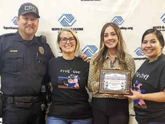 First place appetizer: Lieutenant Kevin Daniel, Captain Wendy Alley, and Administrative Assistant Laura Edman with the Columbus Police Department; pictured with Morgan Barten.