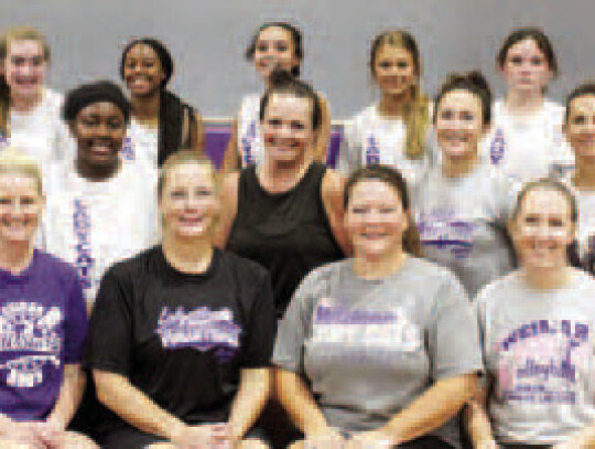 The JV Purple team with the 1991-2003 graduating classes.