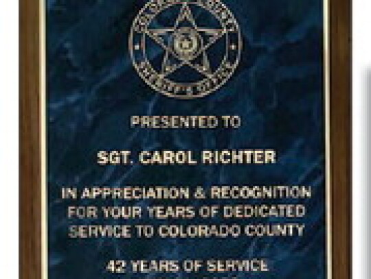 Retiring Colorado County Sheriff’s Office sergeant Carol Richter received honors for 42 years of service.