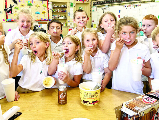 Second graders at St. Michael Catholic School enjoy a ‘delicious’ demonstration of the properties of matter as a solid, liquid and gas with root beer floats, educators say. Sandra Muras (not shown) teaches the learners.