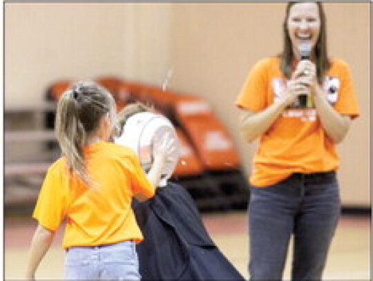 Wright delivered the pie with accuracy as the main event of the fundraiser and pep rally.