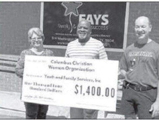 The CCWO donated to the Family and Youth Services organization. From left is CCWO President Debbie Braden, FAYS Executive Director Daniel Poré and Dr. Robert Gobert, member of the FAYS board of directors.