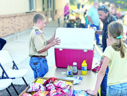 The Boy Scouts fundraised with snacks and hot dogs during the event in Columbus.