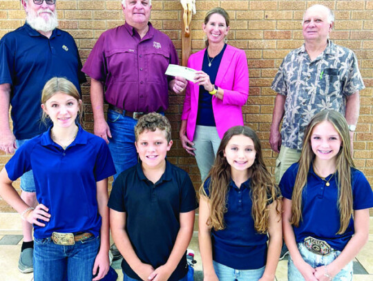 The Columbus KC Council #2971 recently donated $5000 to the construction of a new playground fence. Pictured from left in the front are St. Anthony ambassador officers Logan Glueck, Jacob Muzny, Colette Harrell and Parker Pilat. In the back row from left 