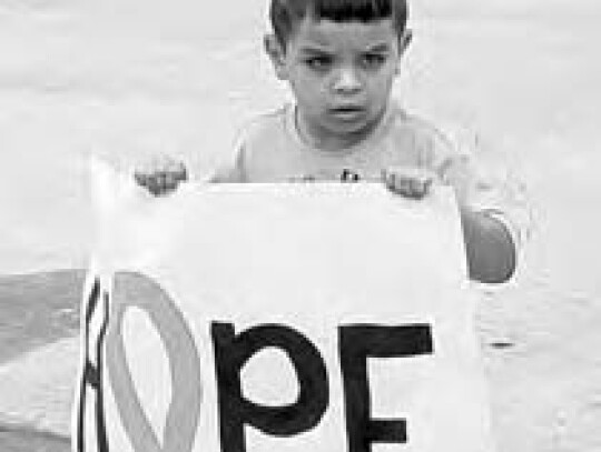 Ezra and many other Lil Einstein children held signs with encouraging messages for survivors.