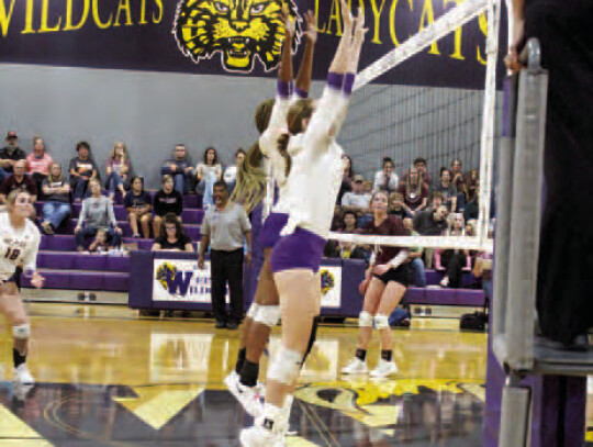 Sophomore Tower Bevin Brenner and Janiyah Cooper with a massive double block on outside hitter.