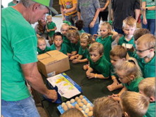 PreK 3, PreK 4 and Kindergarten took a field trip to Kids, Cows and More on Wednesday, Oct. 25. Farmer Mark taught the students about the growth of chicks inside eggs. Students also pet chickens, pigs, goats and sheep as well as feeding cows and a Brahma 