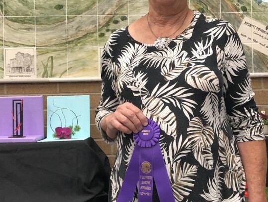 Regena Williamson took the overall high-point award at the flower show.