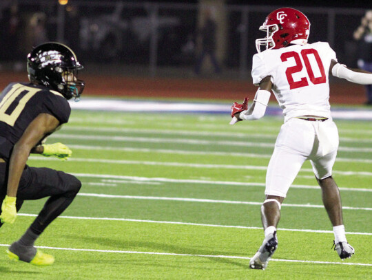 Cardinals defensive back Elijah Usher keeping his receiver in front of his forcing an incompletion.