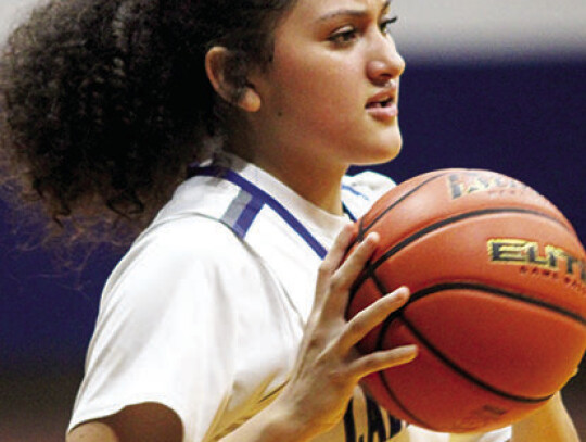 Jayden Moreida checking the ball in for her team. Citizen | Trenton Whiting