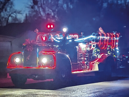 Local fire departments participated in the parade with their official vehicles.