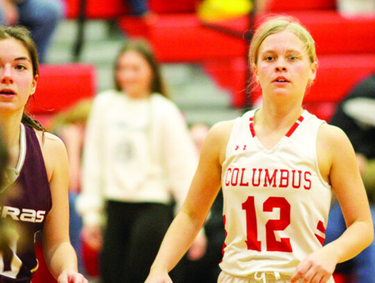 Karlee Mathis watching the ball move around while finding open space to be an option for a pass.