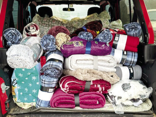 The charity drive received 185 blankets from Columbus residents to help give one to each resident in the selected communities.