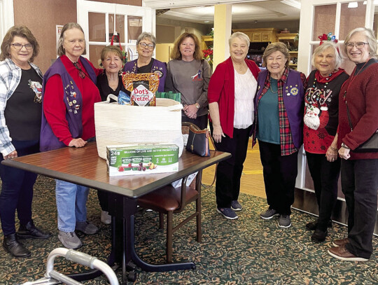 Weimar Encore Lions delivered 100 Christmas goodie bags containing games, note pads, books and more to Weimar and Schulenburg care facilities.