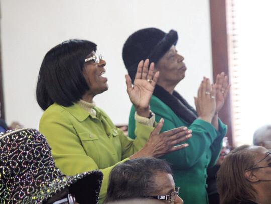 Congregation members enjoy the 125th Church Anniversary celebration at New Greater Smith Chapel Baptist Church Sunday, Jan. 14.