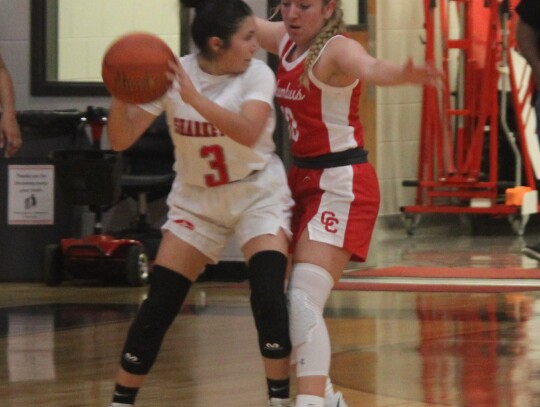 Ella Berger playing aggressive defense leading to a turnover.