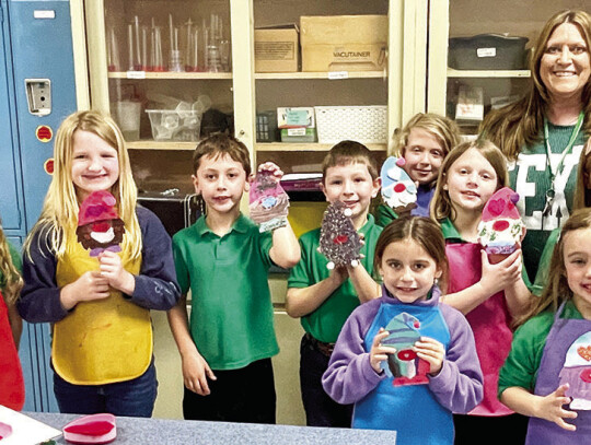 St. Michael Catholic School at Tuesday’s After School Art program. In the front row from left are Avery Bittner and Claire Holman. In the middle row from left are Sadie Davis, Cora Prichard-Jones, Will Prihoda, Ethan Divin, Isabelle Prichard-Jones and Emily Herzik. The back row is Hadley W...