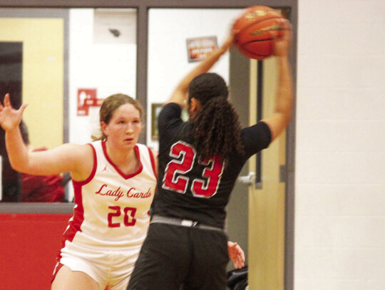 Ella Schneider playing aggressive defense against Palacios.