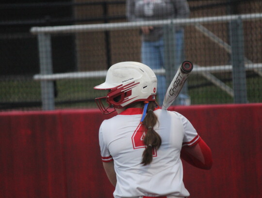 Ellie Brown settling into the batter’s box waiting for the pitch.