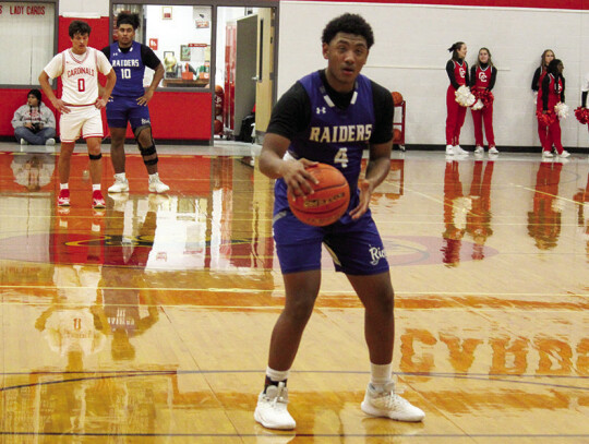 Jalen Porch shooting and missing his free throw but quickly grabbed the rebound for a lay-up. Citizen | Evan Hale