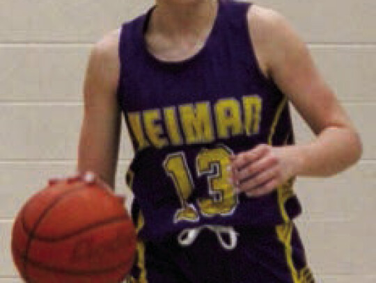 Claire Pavlu carrying the ball up the floor during their game against Mumford.