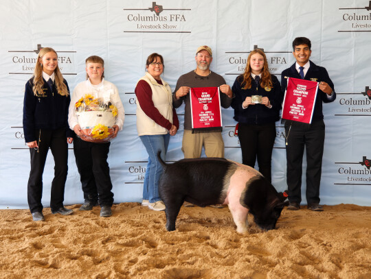 Madilyn Vasek; Bought by Colorado Valley Vet for $3,300. Pictured with Alley Fitzgerald, Michael Ridlen and his family and Javier Mendoza.