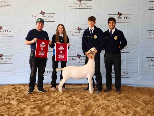 Brayden Fisher; Bought by Columbus Tire Center for $2,850. Pictured with Hadley Sciba Abigail Fisher and Javier Mendoza.